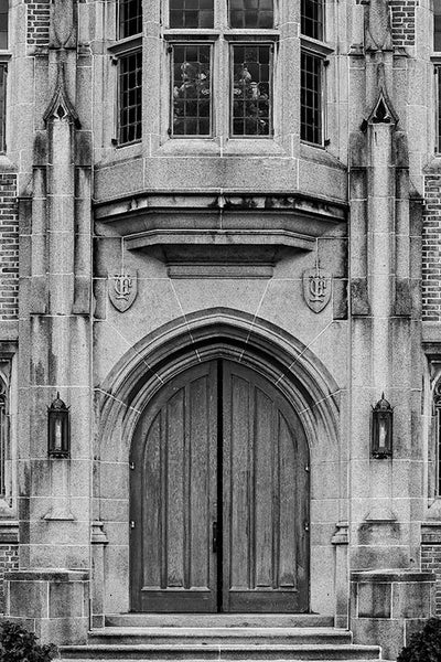 Black and white fine art photograph of the dramatic front doors to the Erastus Milo Cravath Memorial Library on the Fisk University campus in Nashville, Tennessee. 