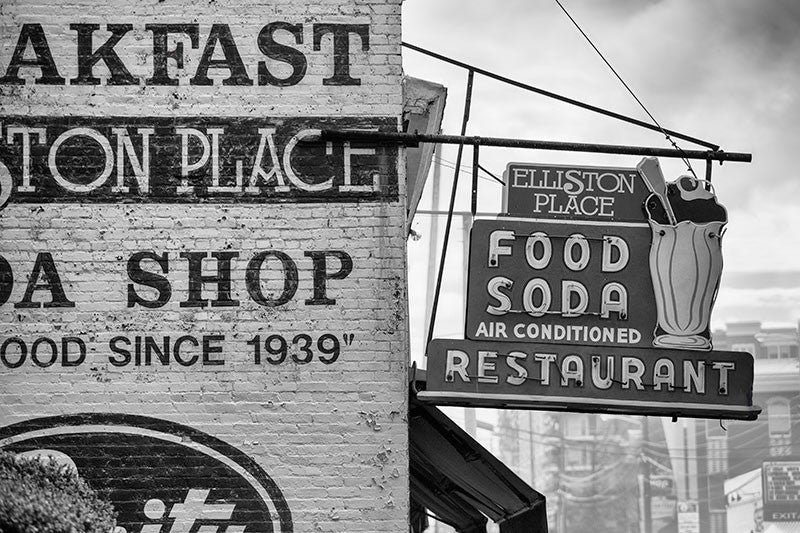 Black and white photograph of the vintage sign for Elliston Place Soda Shop in Nashville's West End.