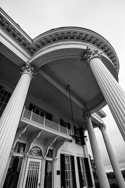 Black and white architectural photograph of the portico of Whitehaven House, an 1860s southern mansion in Paducah, Kentucky.