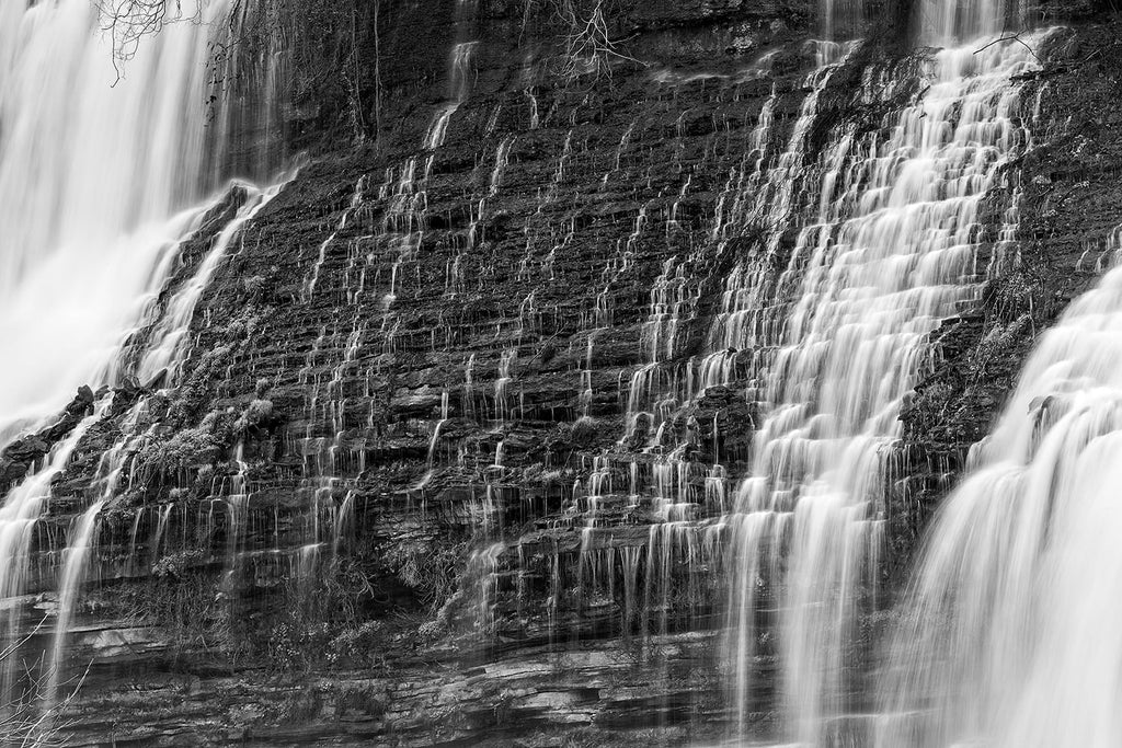 Waterfall Cascades on Natural Rock Terraces black and white photograph by Keith Dotson