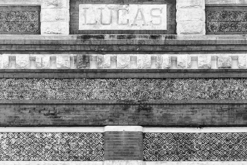 Black and white architectural detail photograph showing designs and patterns on the historic Lucas building in downtown Florence Alabama