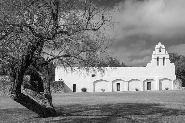 Black and white photograph of the old Spanish Mission San Juan in San Antonio, Texas. 