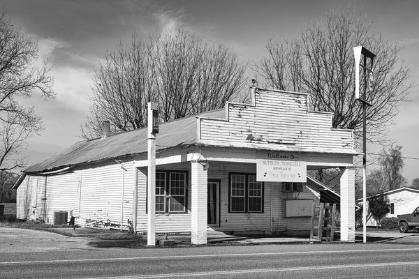 Black and white photograph of an old clapboard store building located on Highway 19 in Nutbush, Tennessee, which was made famous in the song "Nutbush City Limits" by Tina Turner and is also her birthplace.