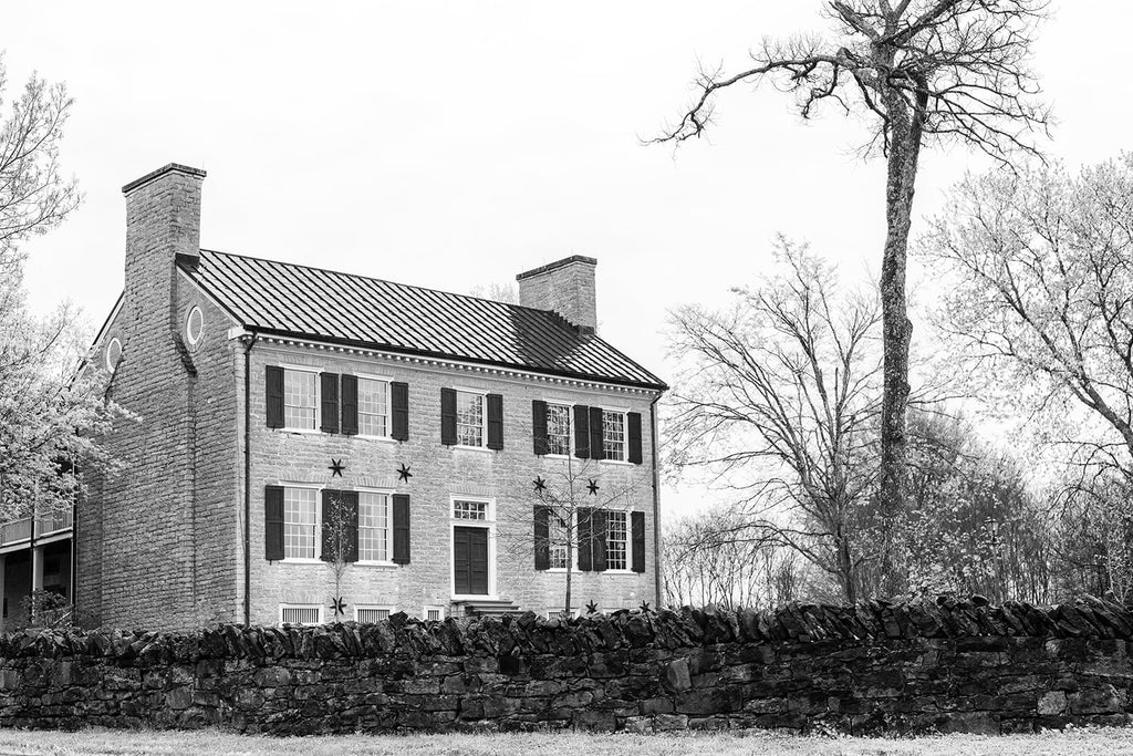 Black and white photograph the historic Cragfont House in Castalian Springs, Tennessee. The house was built between 1798 and 1802, by General James Winchester, who became one of the founders of Memphis.