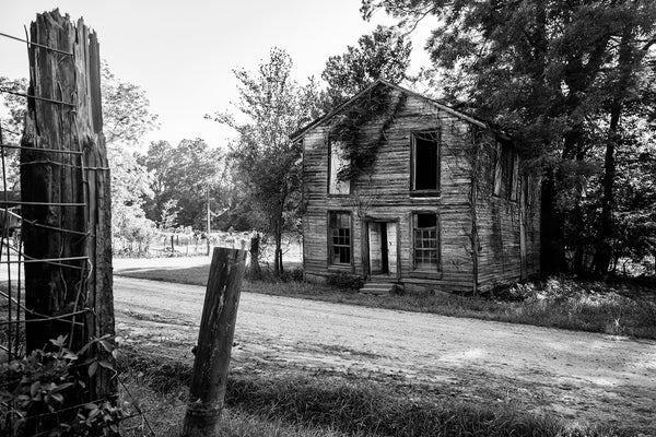 Black and white photograph of an abandoned 1800s Masonic lodge in a deserted and isolated ghost town.
