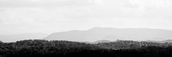 Black and white panoramic landscape photograph of the hazy, ancient mountains of the Eastern US.