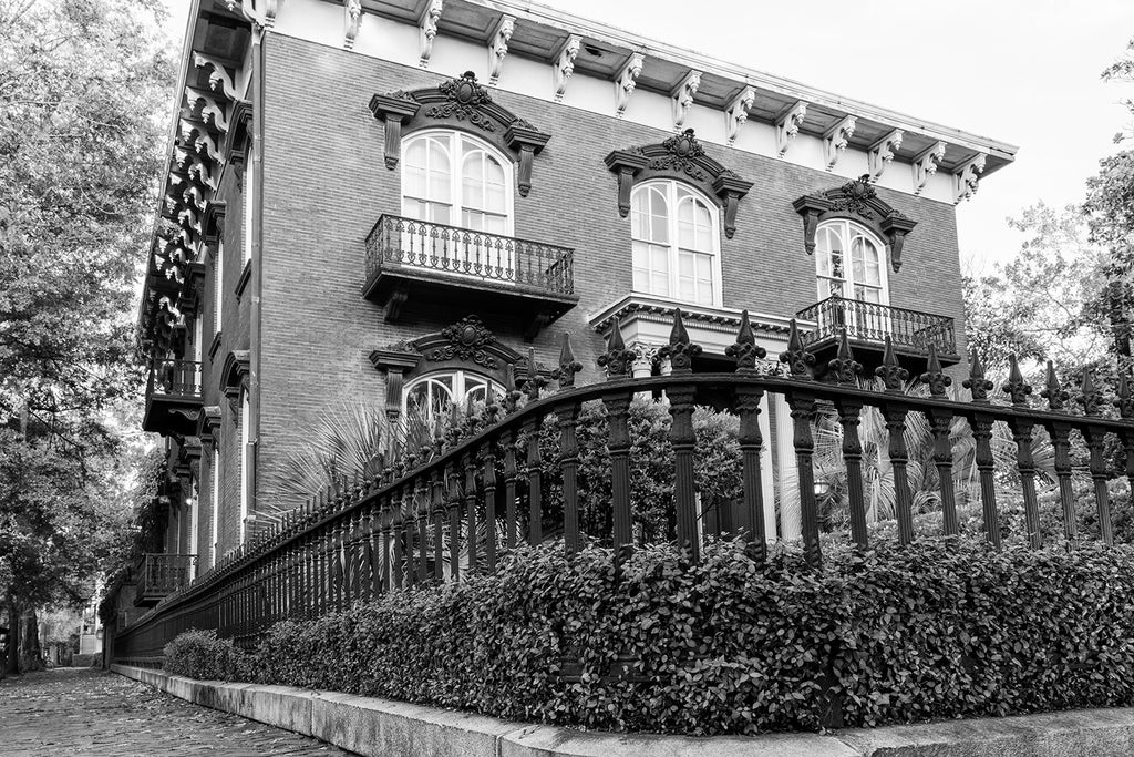 Black and white photograph of Savannah's historic and notorious Mercer-Williams House. Completed in 1868, the house is famous from its central part in the book and movie Midnight in the Garden of Good and Evil.