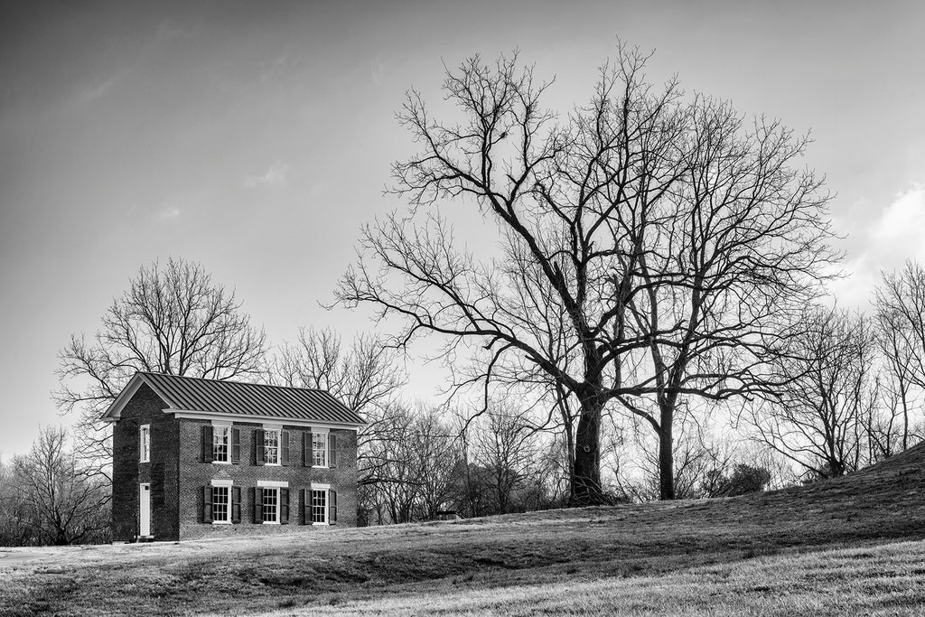 Black and white photograph of the historic Boiling Springs Academy, built 1830. This one room schoolhouse in Brentwood, Tennessee has the unique distinction of being built on the site of an 800-year-old Native American mound site.