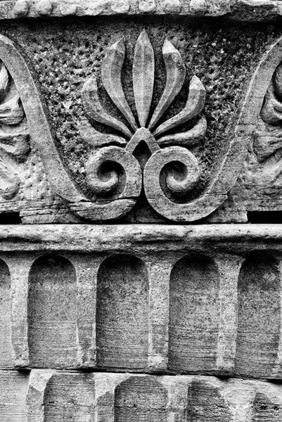Black and white detail photograph of the design motif on a Greek Revival column in Nashville. Originally part of the Tennessee State Capitol building, these columns were removed during a renovation and have been scattered around Nashville as a reminder of its reputation as "the Athens of the South."
