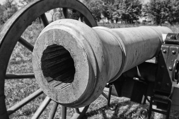 Black and white photograph of a civil war cannon on the site of the bloody battle of Murfreesboro, Tennessee on Stones River civil war battlefield.