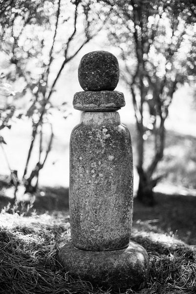Black and white photograph of a statue in Nashville's Japanese Garden.