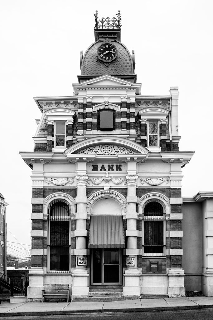 Black and white photograph of the historic Peoples National Bank building -- originally the Cloud State Bank -- built 1882 in the small town of McLeansboro, Illinois.