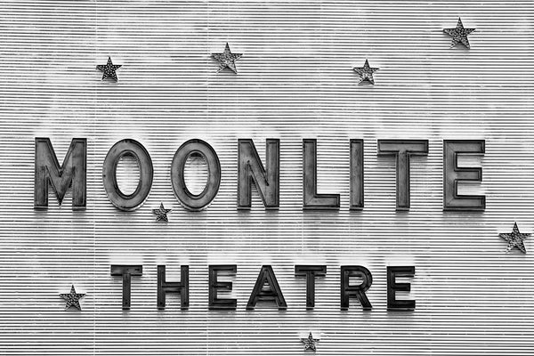 Black and white photograph of the vintage Moonlite Theatre sign found in the beautiful town of Abington, Virginia. The theatre was built in 1949. After sitting abandoned and neglected for many years, the theatre has found new life and activity recently.