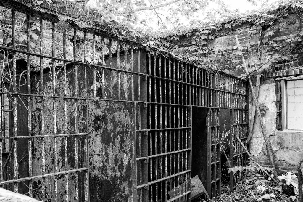 Black and white photograph of the ruined interior of the abandoned old jail in the small Delta town of Itta Bena, Mississippi.