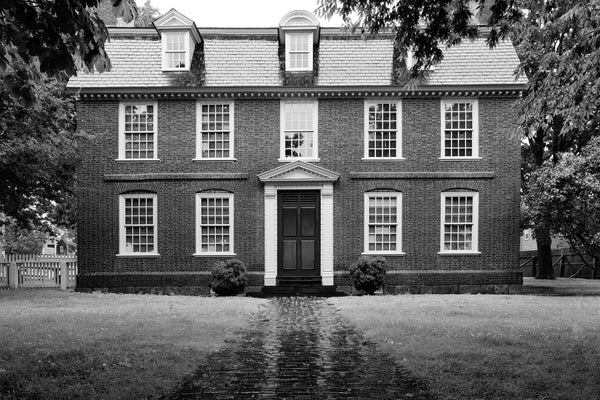 Black and White Photograph of the historic Derby House, built 1762, seen on a rainy morning in Salem, Massachusetts.