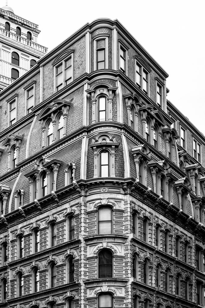 Black and white photograph of the beautiful Powers Building, built 1869 in Downtown Rochester, New York. Designed by Rochester architect Andrew Jackson Warner, the Powers Building was once the tallest building in the city.