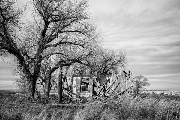Black and white photograph of the ruins of the old Broyles Gas Station on Route 66 in Glenrio, New Mexico.