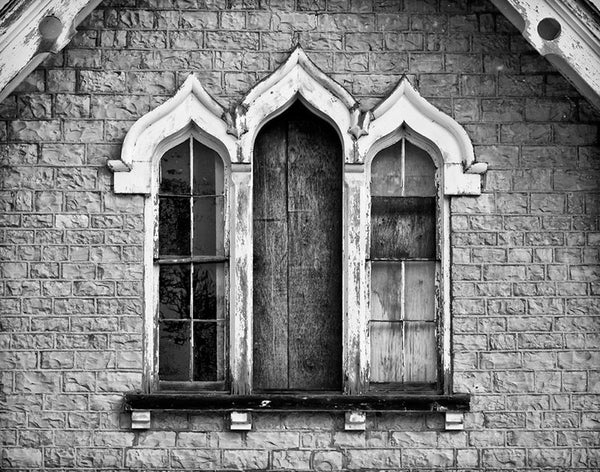 Black and white architectural detail photograph of the windows of a carriage house and chapel, built 1840 on the prairie in Dousman, Wisconsin (between Milwaukee and Madison). The church originally founded on the second floor of this small carriage house is still a thriving congregation in a newer building just a short distance away.