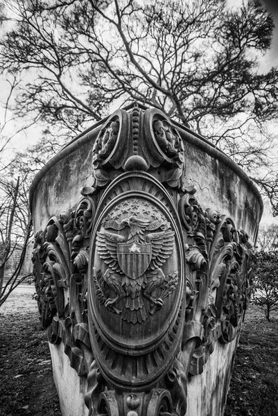 Black and white photograph of a concrete ship's bow monument to the USS Tennessee (later renamed the "Memphis"), an armored cruiser launched in 1904. The monument, located in Nashville's Centennial Park, features the actual bronze scrollwork from her bow, which was removed from the ship in 1909. The Memphis was damaged by shipwreck in 1916. The name "USS Tennessee" was reassigned to a battleship in 1916.