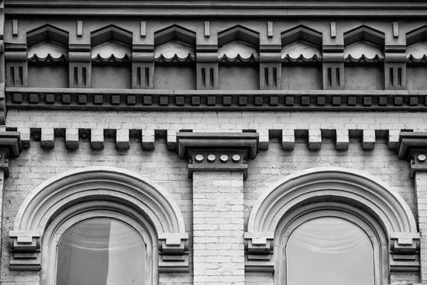 Black and white photograph of a beautifully ornate historic roofline on 2nd Avenue in downtown Nashville.