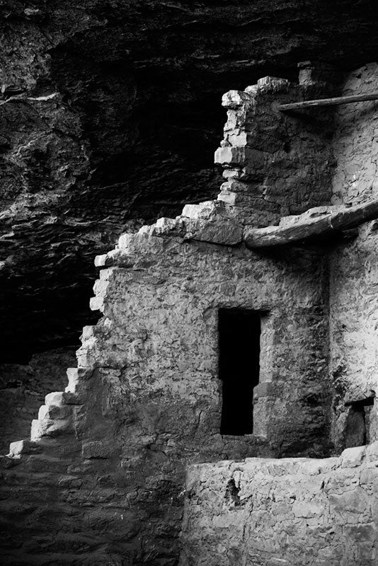 Black and white photograph of one of the centuries old mud-brick walls at Mesa Verde, Colorado.