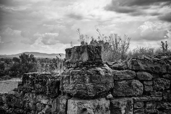 Black and white photograph of the view from the old stone ruins of Fort Negley on a hillside near Nashville. Fort Negley is a star-shaped structure built of limestone blocks on a hilltop south of the city, and was the largest inland fort built during the American Civil War. The fort was built by the Union army in 1862 as a defensive post after the Confederates lost control of Nashville in successive battles, but with fighting concentrated in other areas, the fort never saw action.