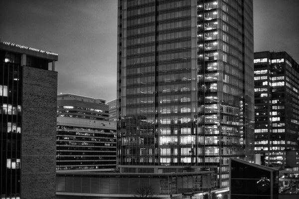 Black and white photograph of office tower lights at twilight in Arlington, Virginia, just across the river from Washington, D.C.