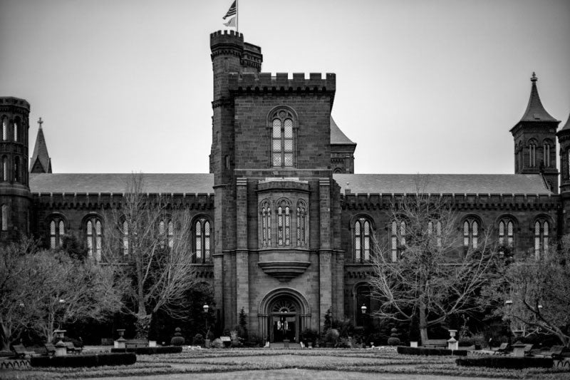 Black and white architectural photograph of ornate stone castle at the Smithsonian Institution in Washington, DC.